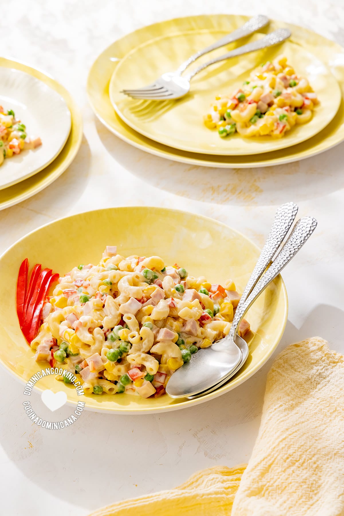 Plates with Ensalada de Coditos (Elbow Pasta Salad)