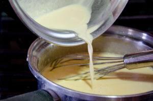 Pouring milk.