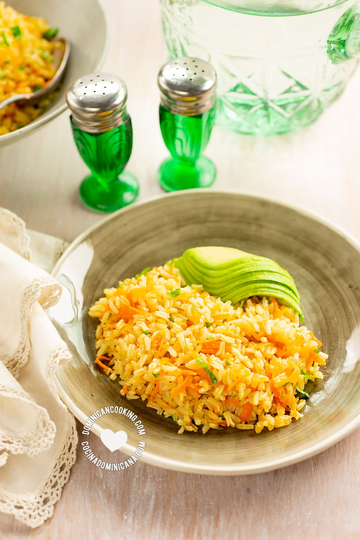 Arroz Amarillo Served with Avocado (Carrot and Onions Yellow Rice)