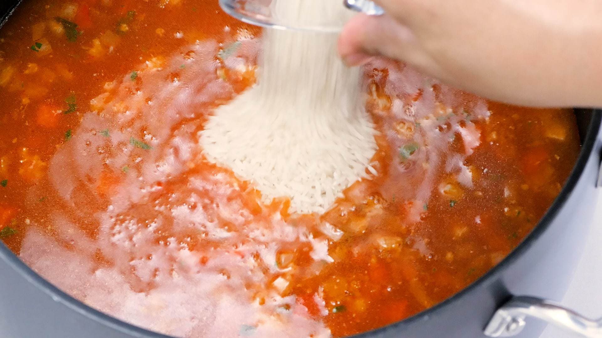 Adding rice to pot
