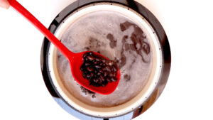 Boiling black beans.