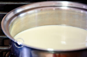 Heating the milk.