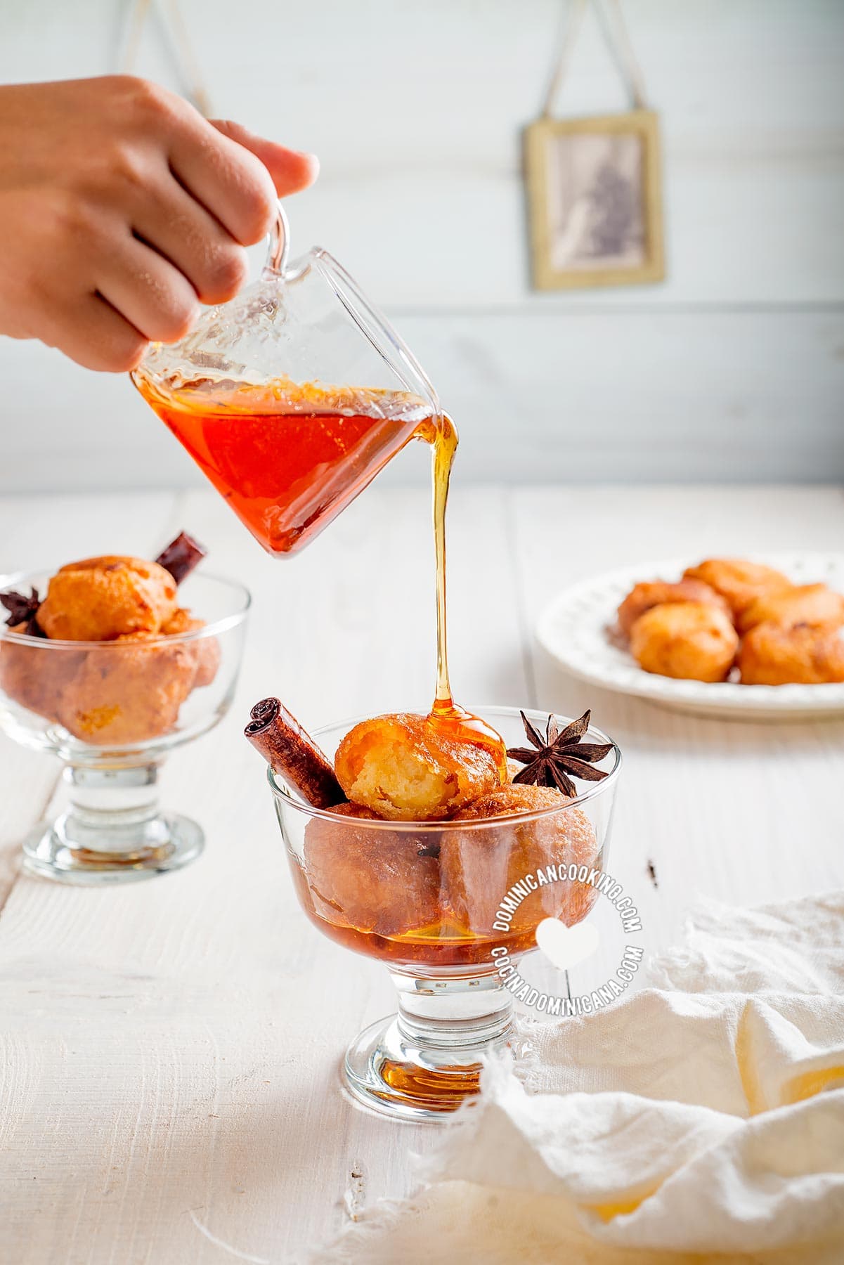 Buñuelos de yuca (cassava sweet puff fritters with spiced syrup).