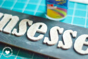 Glueing the letters.