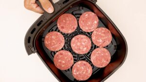 Air frying salami.