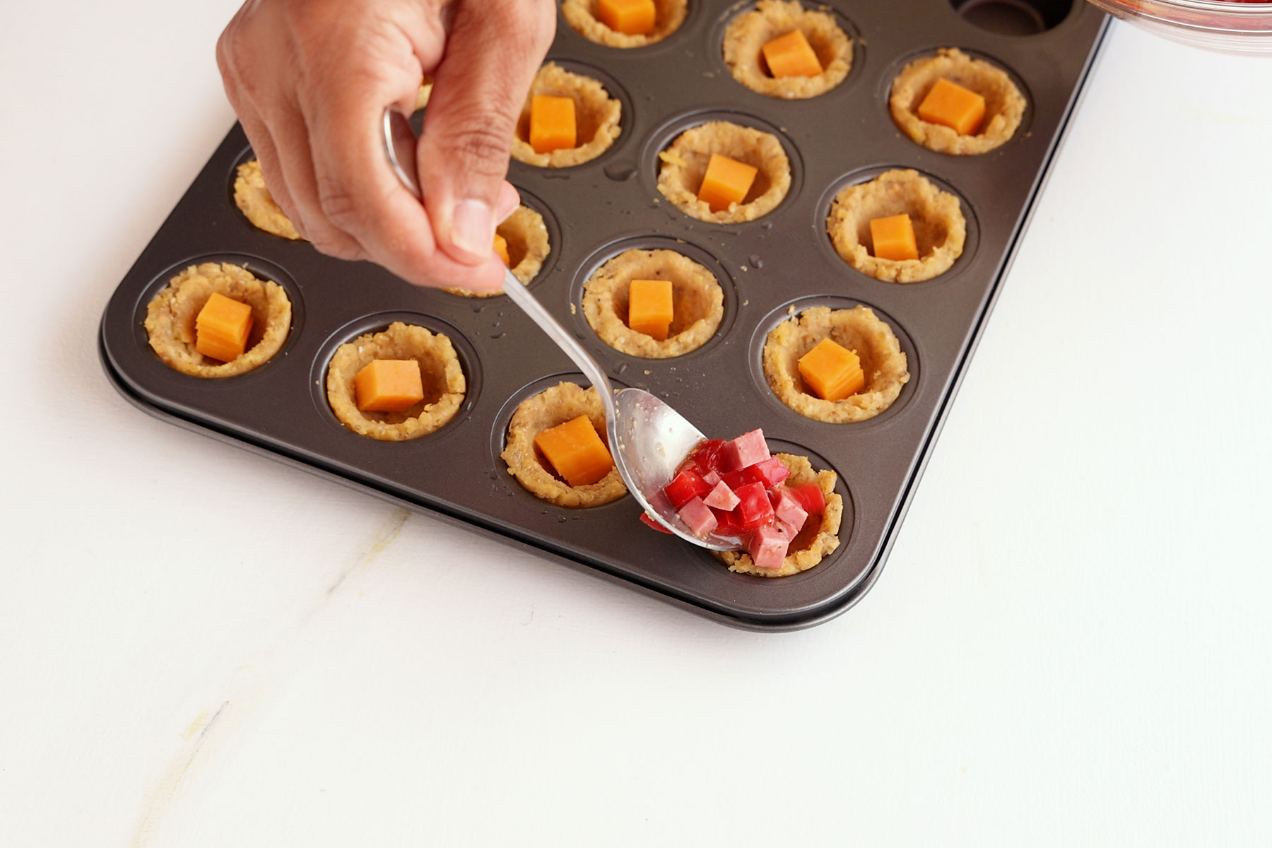 Stuffing plantain cups.