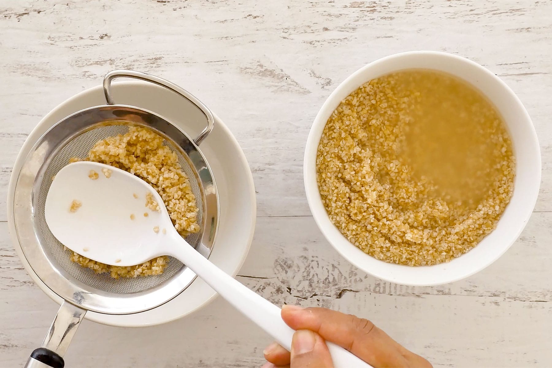 Removing bulgur from water using a fine sieve