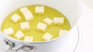 Frying the cheese.