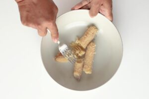 Mashing bananas.