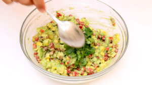 Adding dressing.