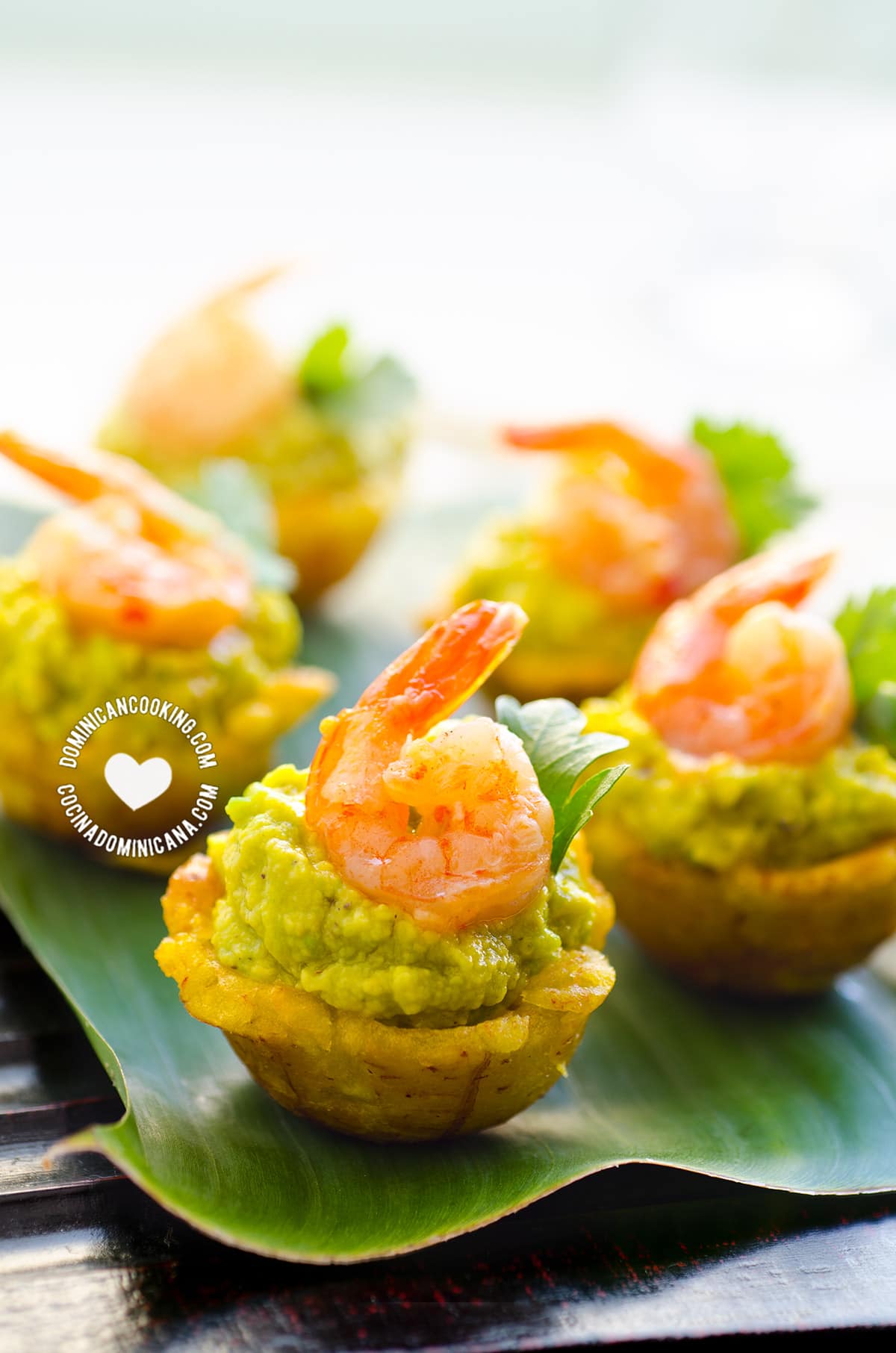 Mofonguitos or tostones rellenos with avocado and shrimp