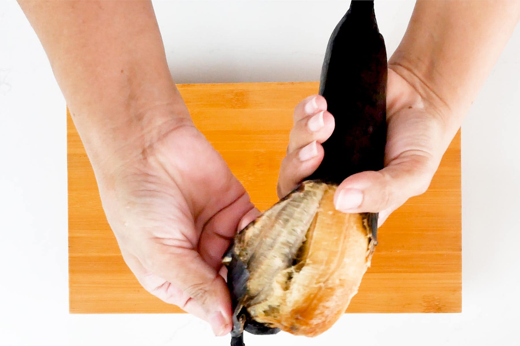 Peeling plantain.