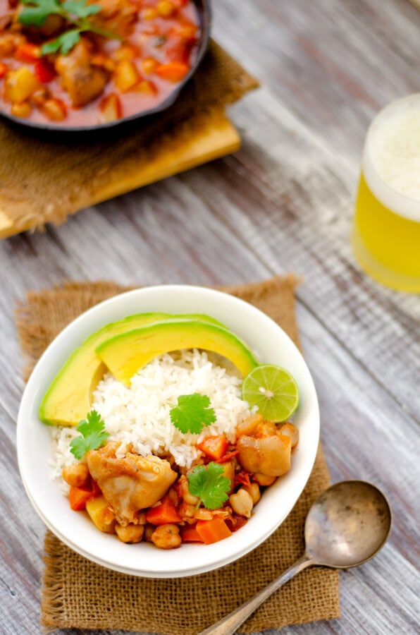 Cocido de Paticas (Pig Trotters Stew) Served with Rice and Avocado