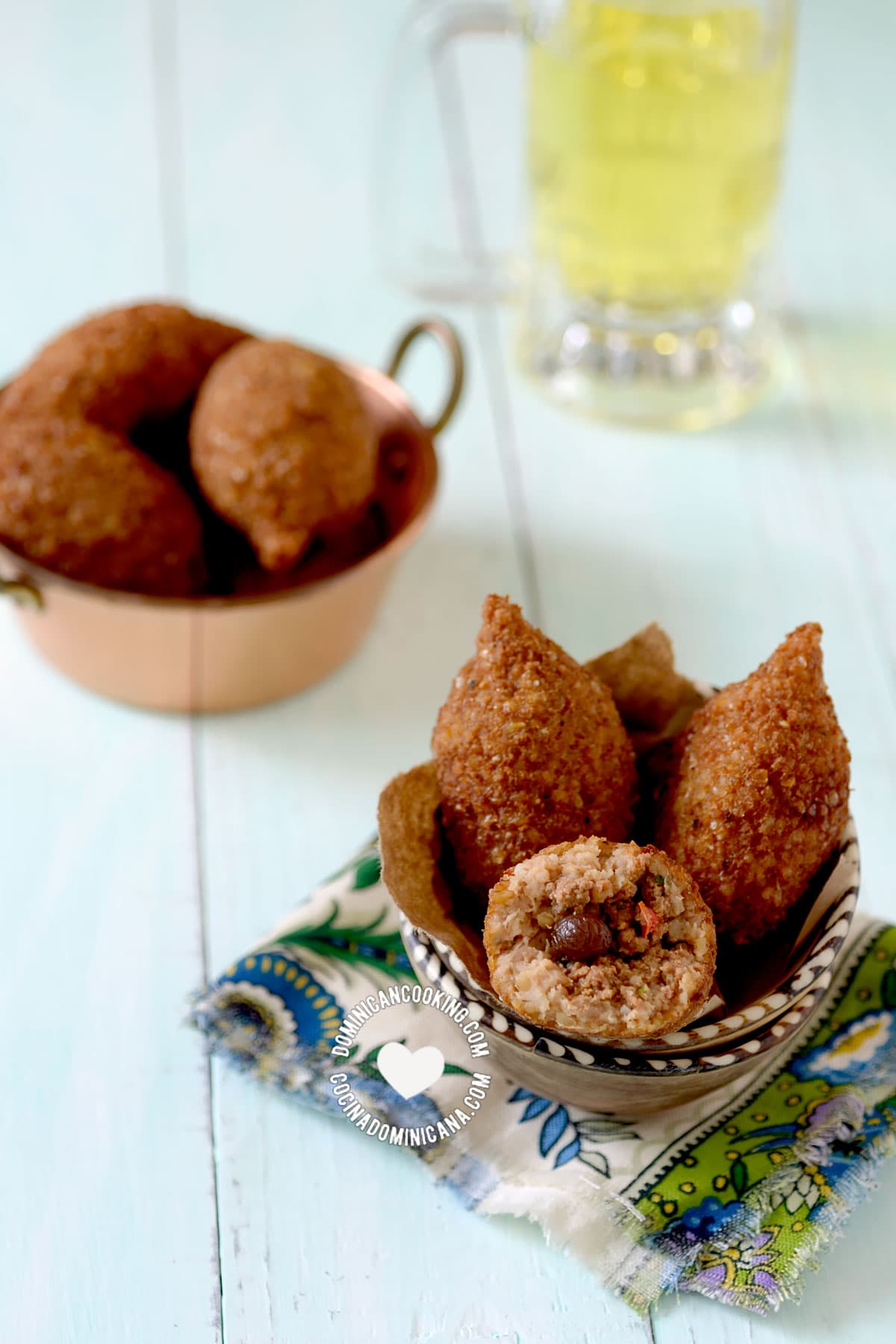 Dominican kipe (kibbeh) in two bowls, beer on the side