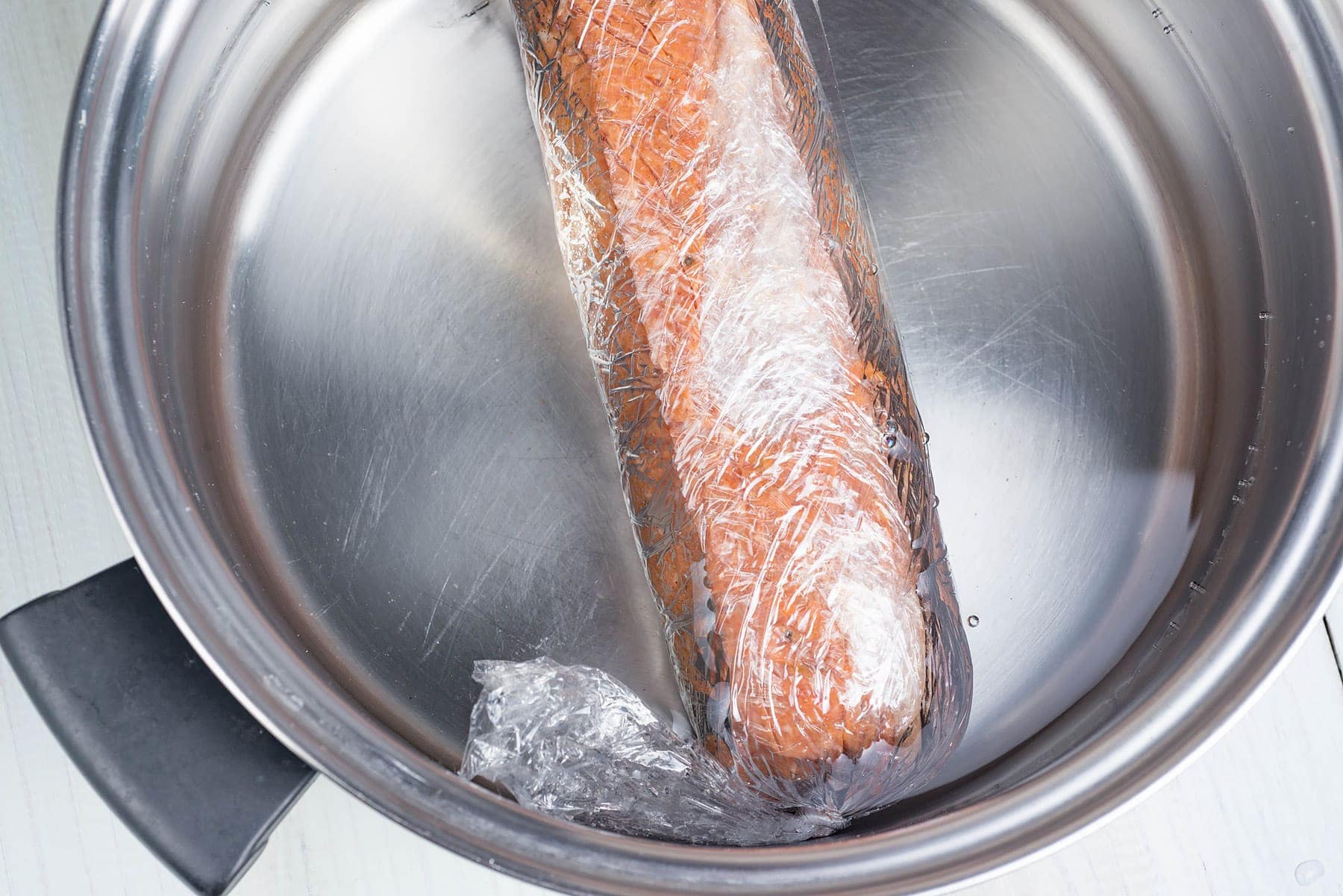 Boiling salami roll
