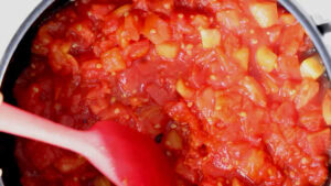 Making tomato sauce.