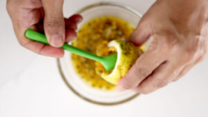 Scooping out pulp.