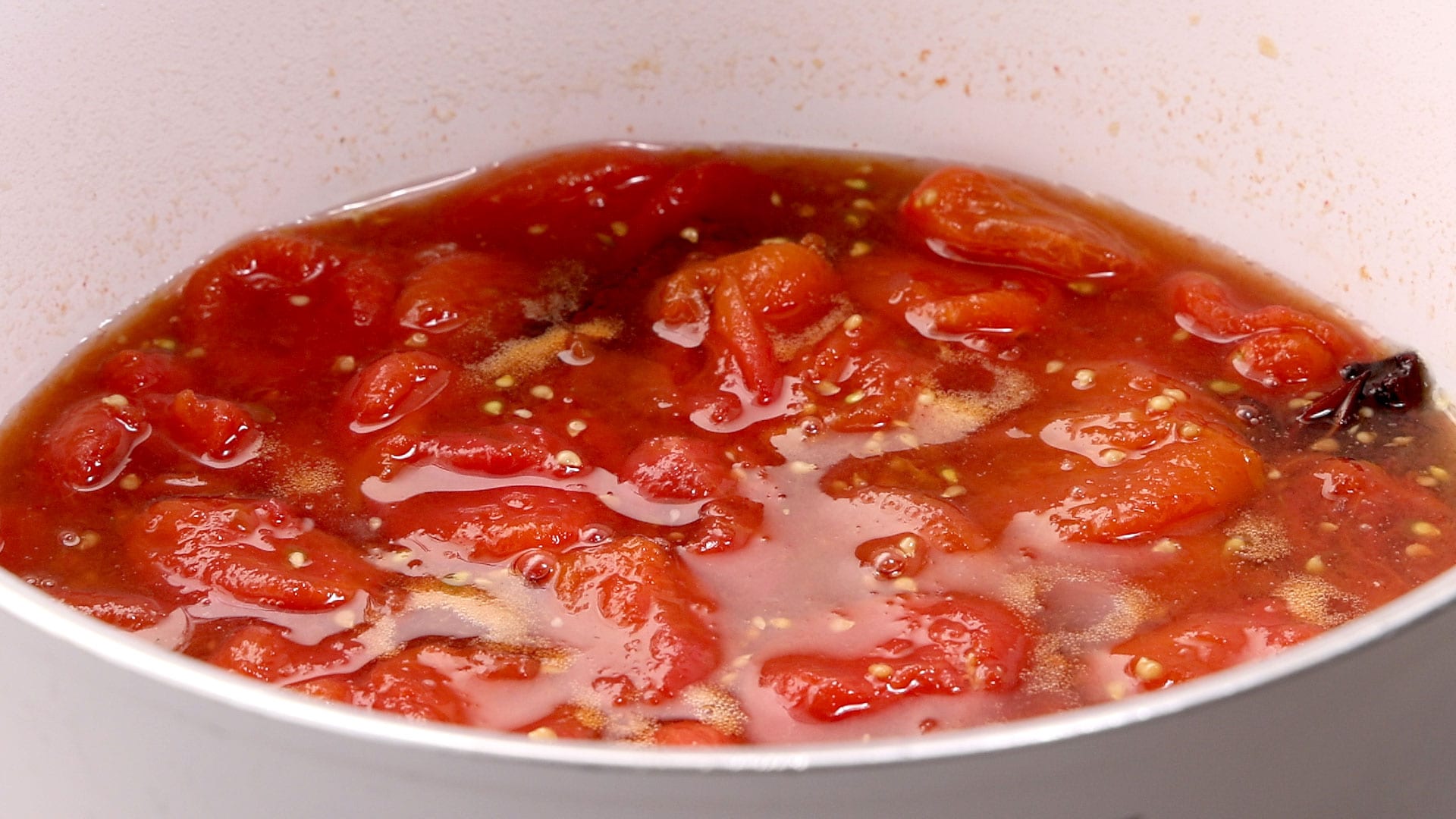 Simmering tomatoes.