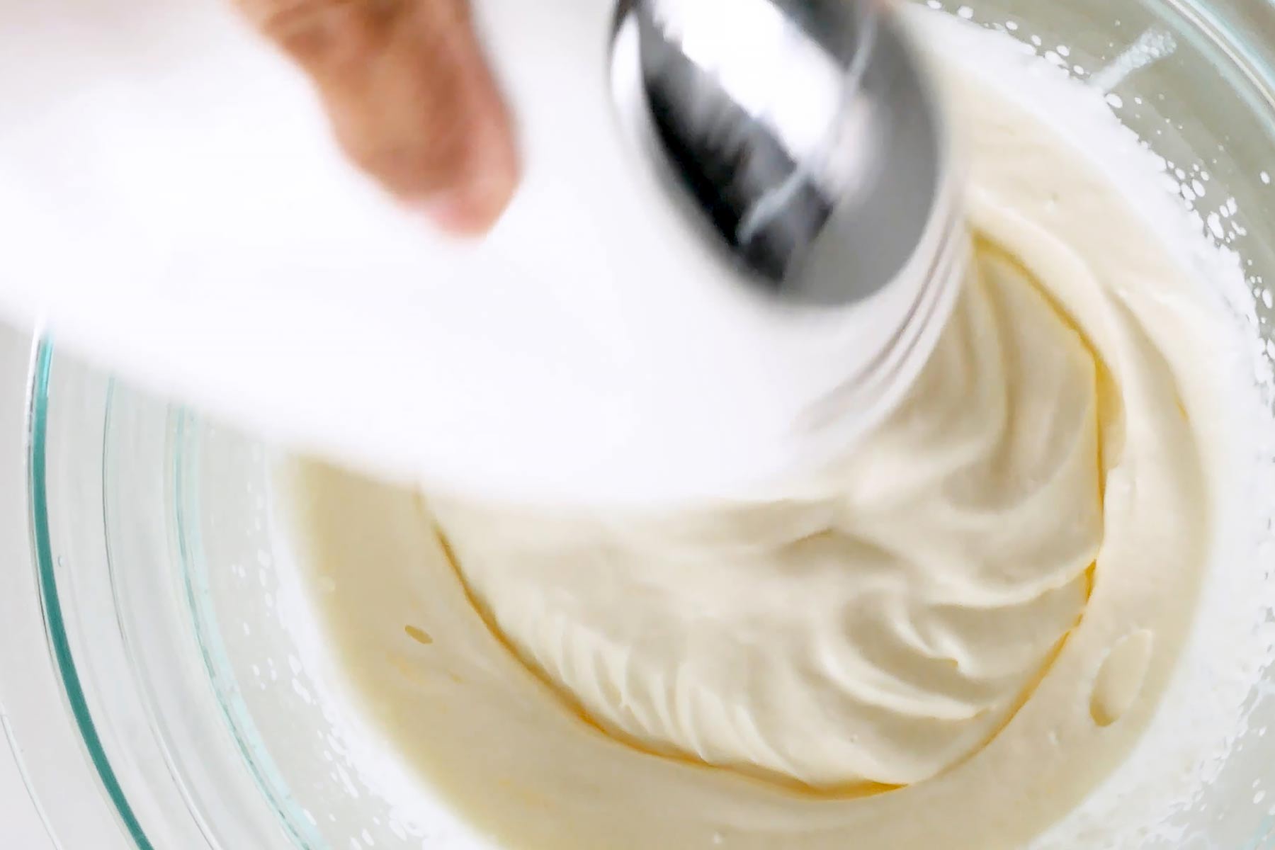 Preparing the whipped cream.